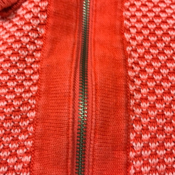 Cute zip front sweater with fun peaked hemline - Picture 4 of 11